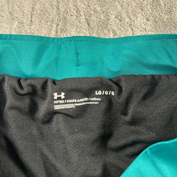 Under Armour men's fitter running shorts in a teal color - Picture 4 of 4